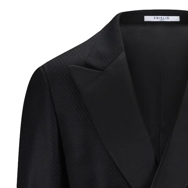 Sort dressjakke fra Frislid Jan Tux, elegant og stilfull med skreddersydd passform og moderne design.