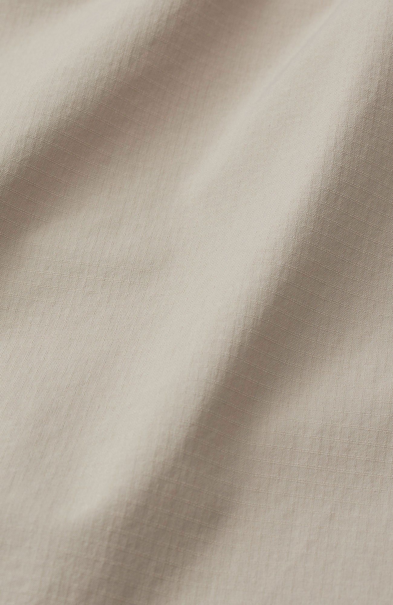Plain Units Leopl Shorts 120 i krittfarge, komfortable sports- eller fritidsshorts med elastisk midje og casual passform.